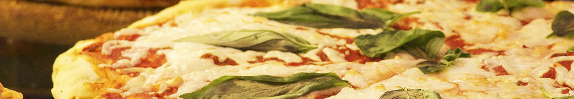 Eating Italian Pizza at Michael's Italian Feast restaurant in Washington, IL.
